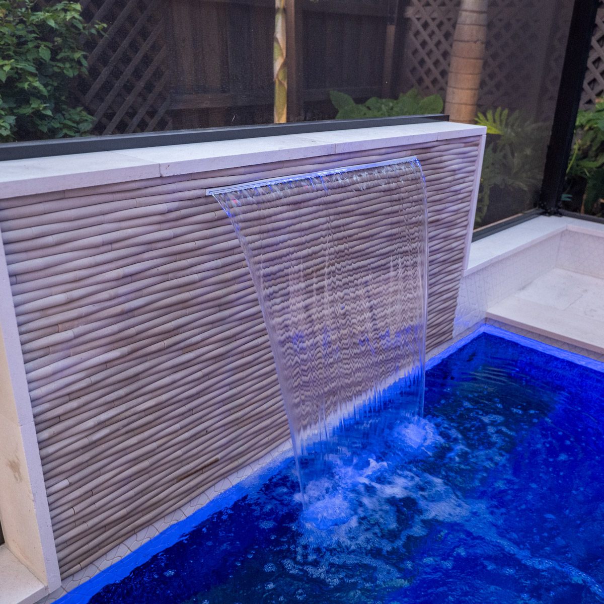 Custom pools designed with water and fire features in Lutz, FL