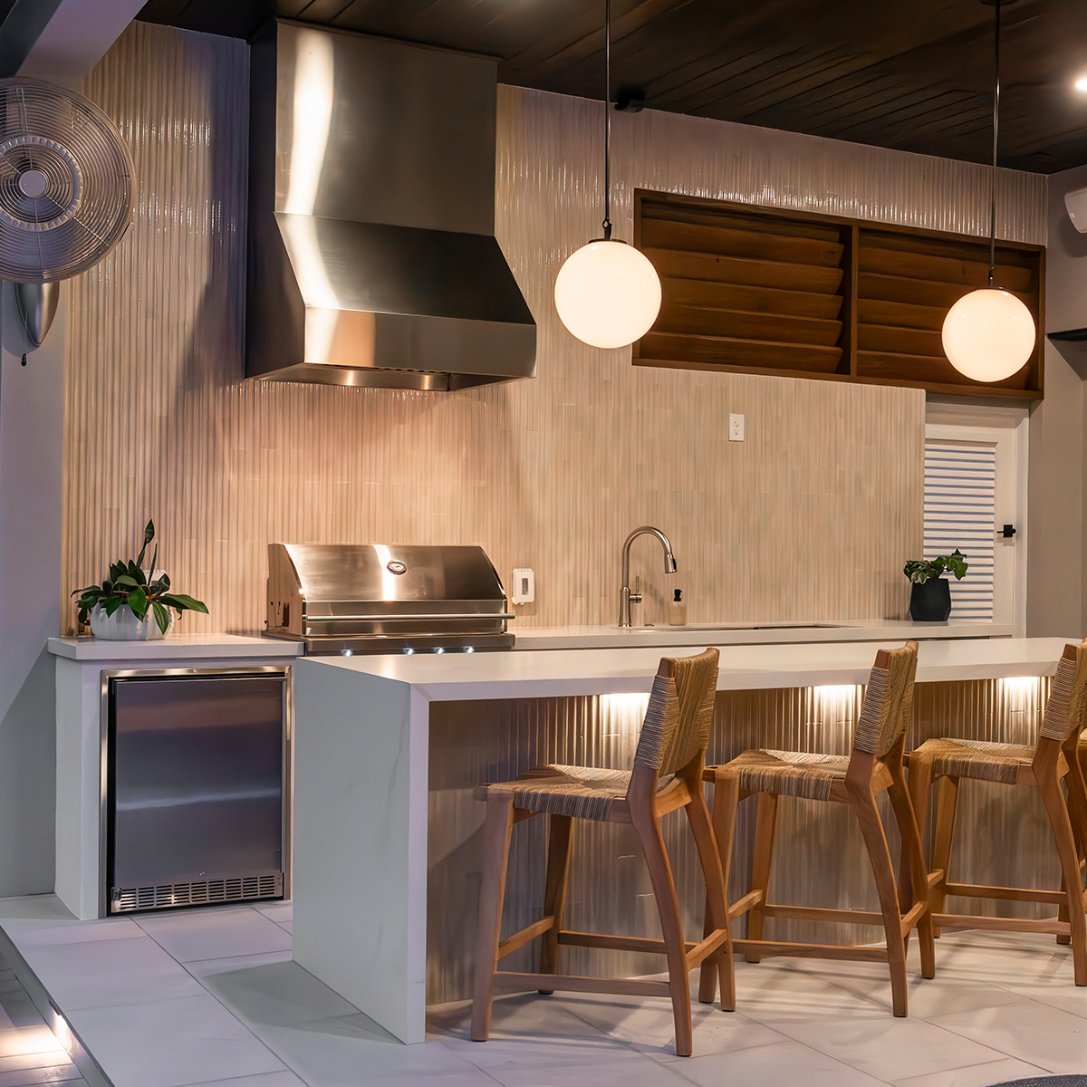 Custom backyards designed with outdoor kitchens in Cheval, FL